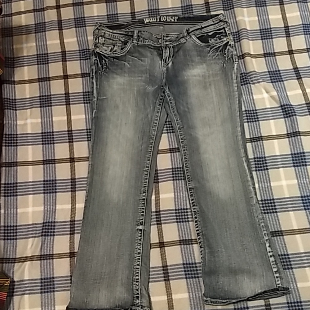 Wallflower stone wash distressed jeans.